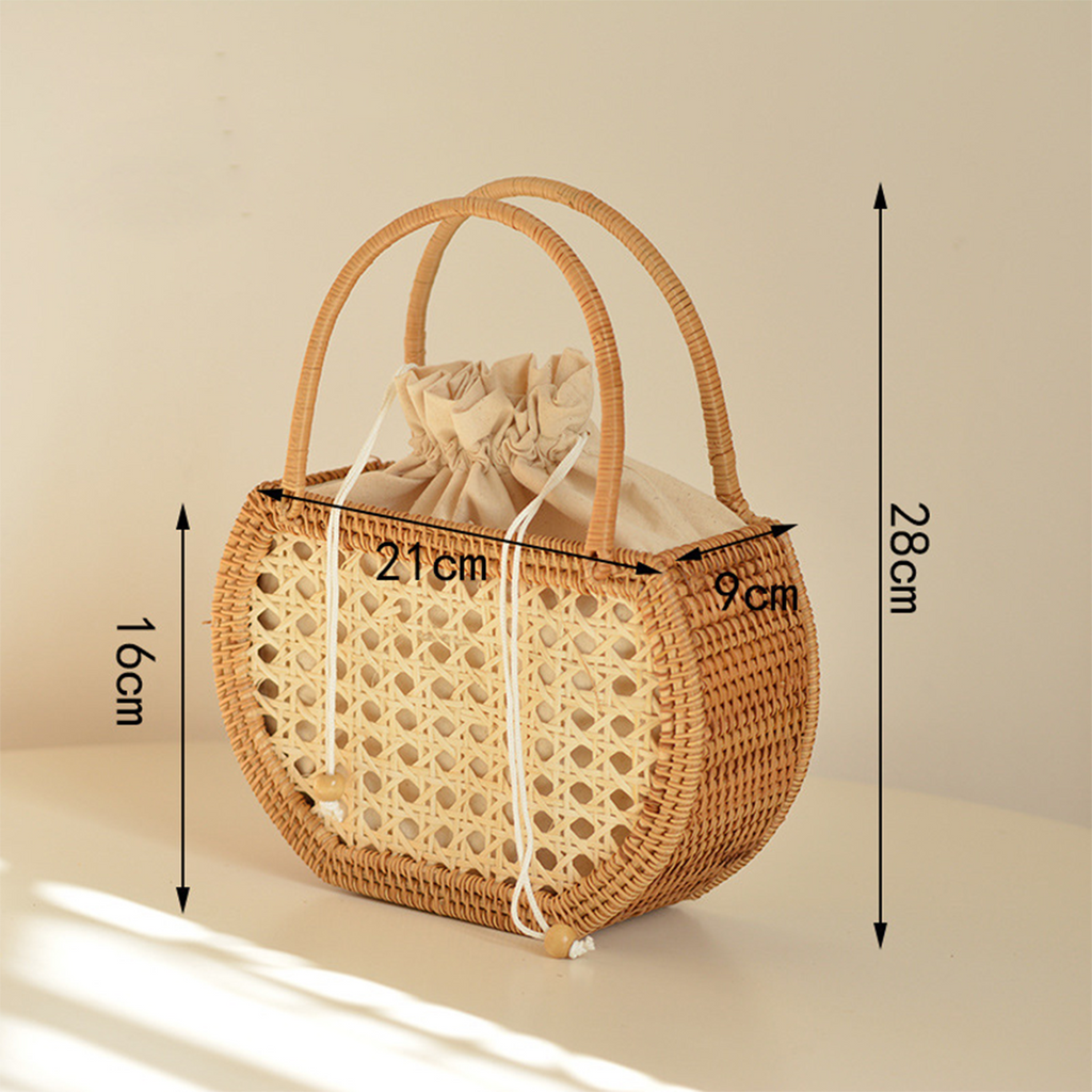 Natural rattan woven hollow oval handbag