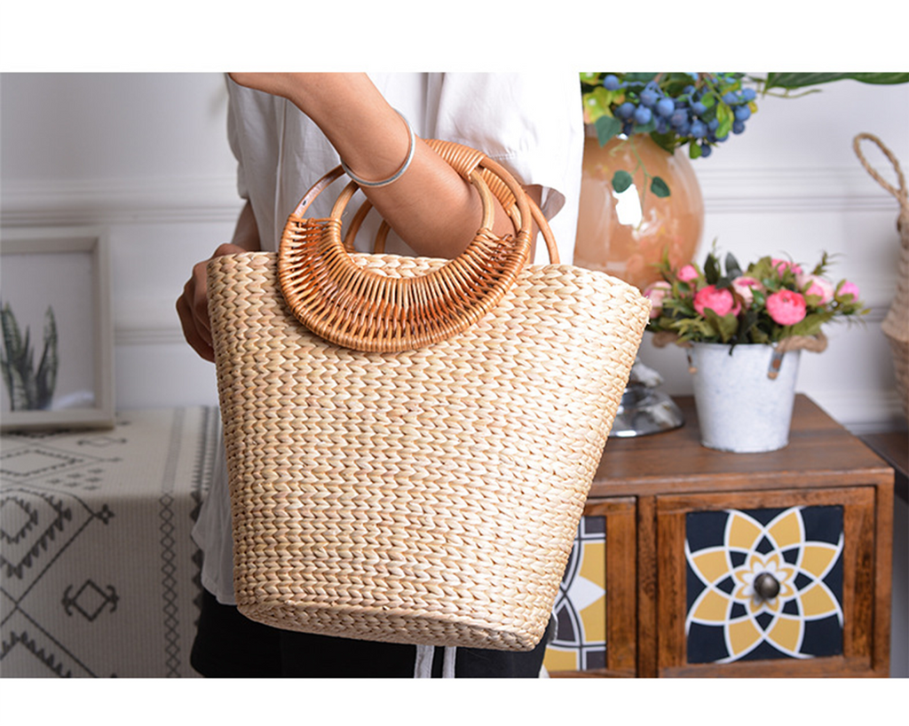 Straw-woven moon-shaped handle handbag