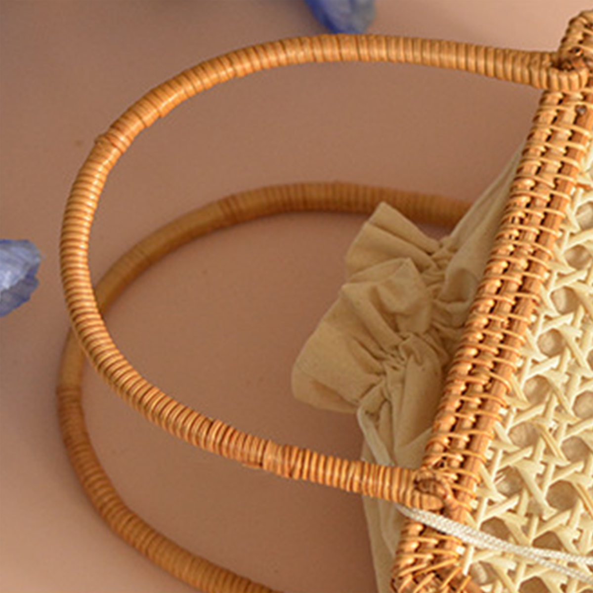 Natural rattan woven hollow oval handbag