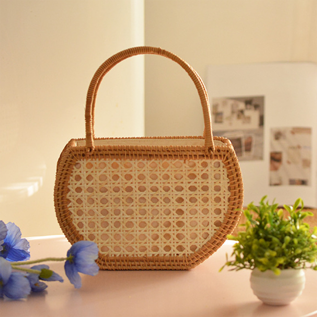Natural rattan woven hollow oval handbag