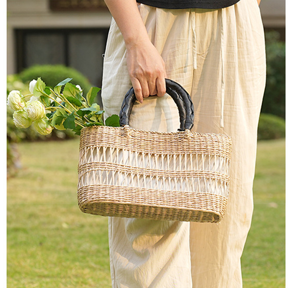 Natural straw woven hollow-out striped handbag
