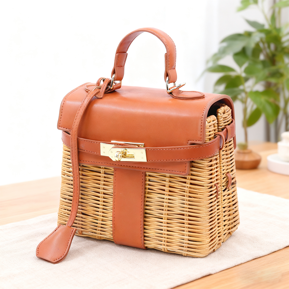 Caramel brown leather patchwork rattan crossbody bag